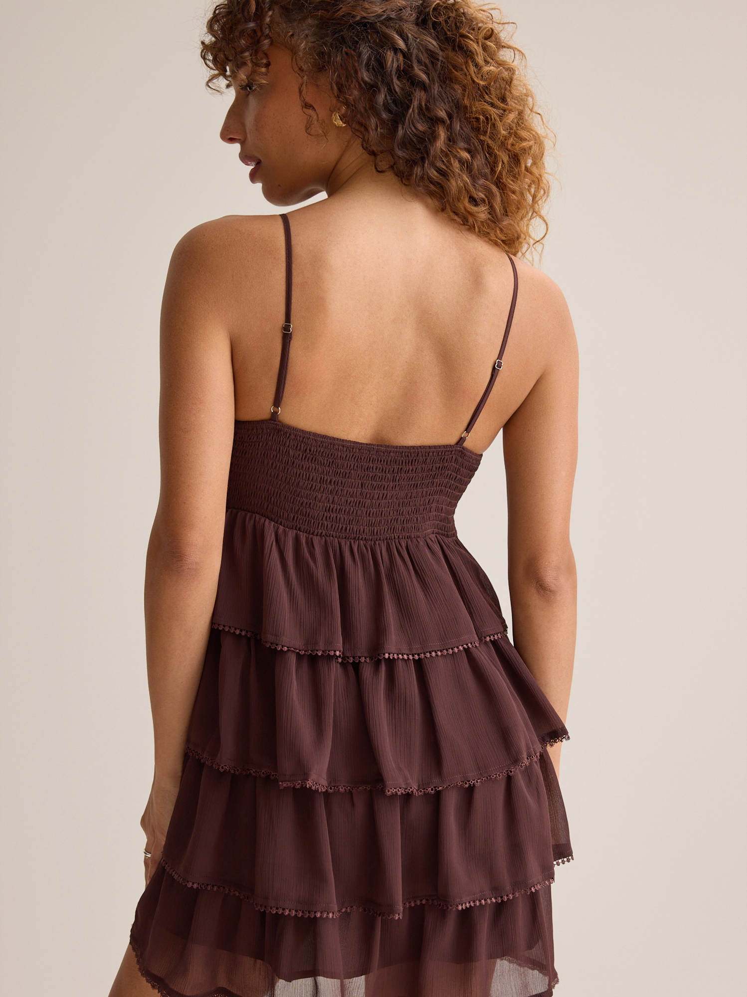 brown tiered mini dress Altar'd State | Saige | CHOCOLATE-BROWN | Material: 100% Polyester, Lining: 95% Polyester, 5% Spandex Color:Ivory Nude The asymmetric hemline offers Season:HIGH SUMMER Paloma Wool I Beige