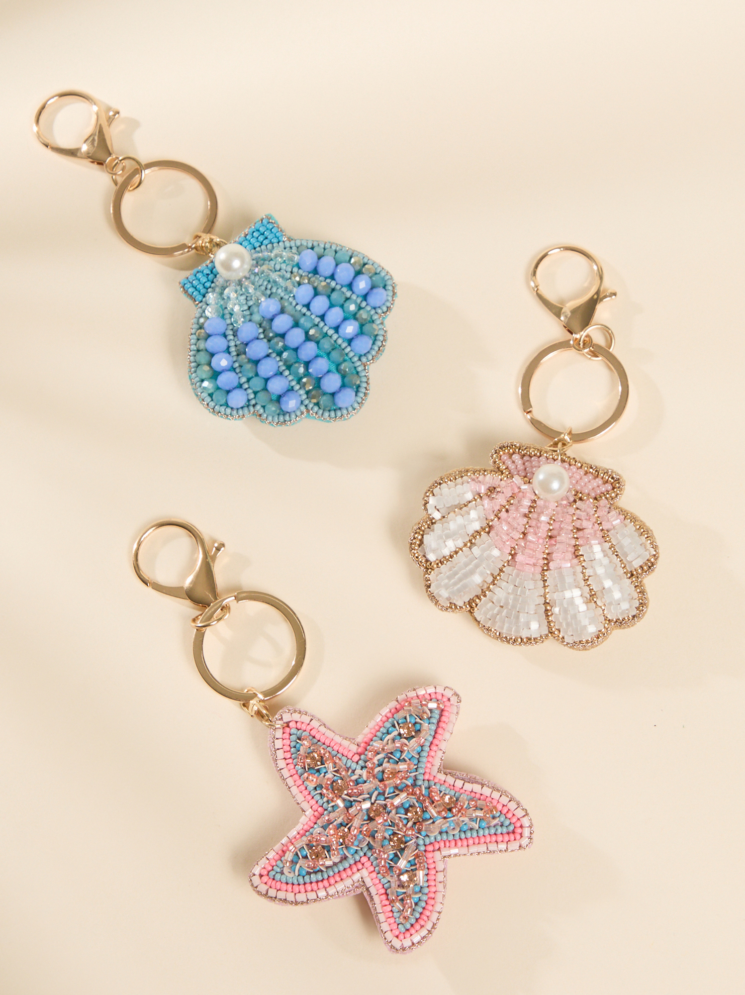 Beaded Seashell Bag Charm in Pink | Altar'd State