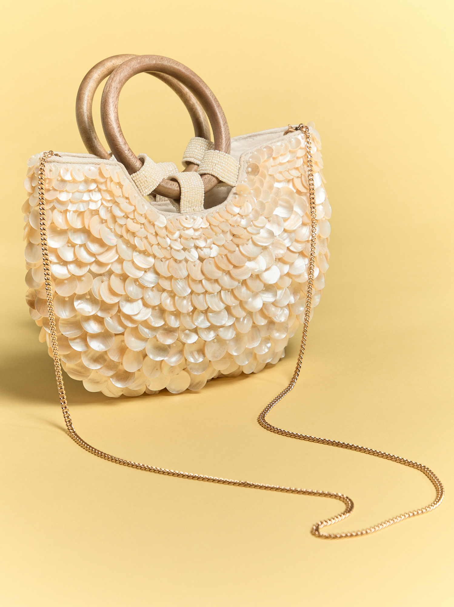 か*さ様 SHIPS for women パールモチーフ バック フレア ジレ Haven Shell Covered Purse in Ivory | Altar'd State