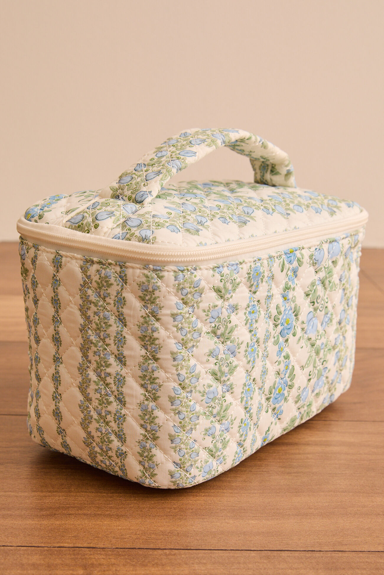 
        Cecile Quilted Makeup Bag in Blue Multi | AS Revival
    