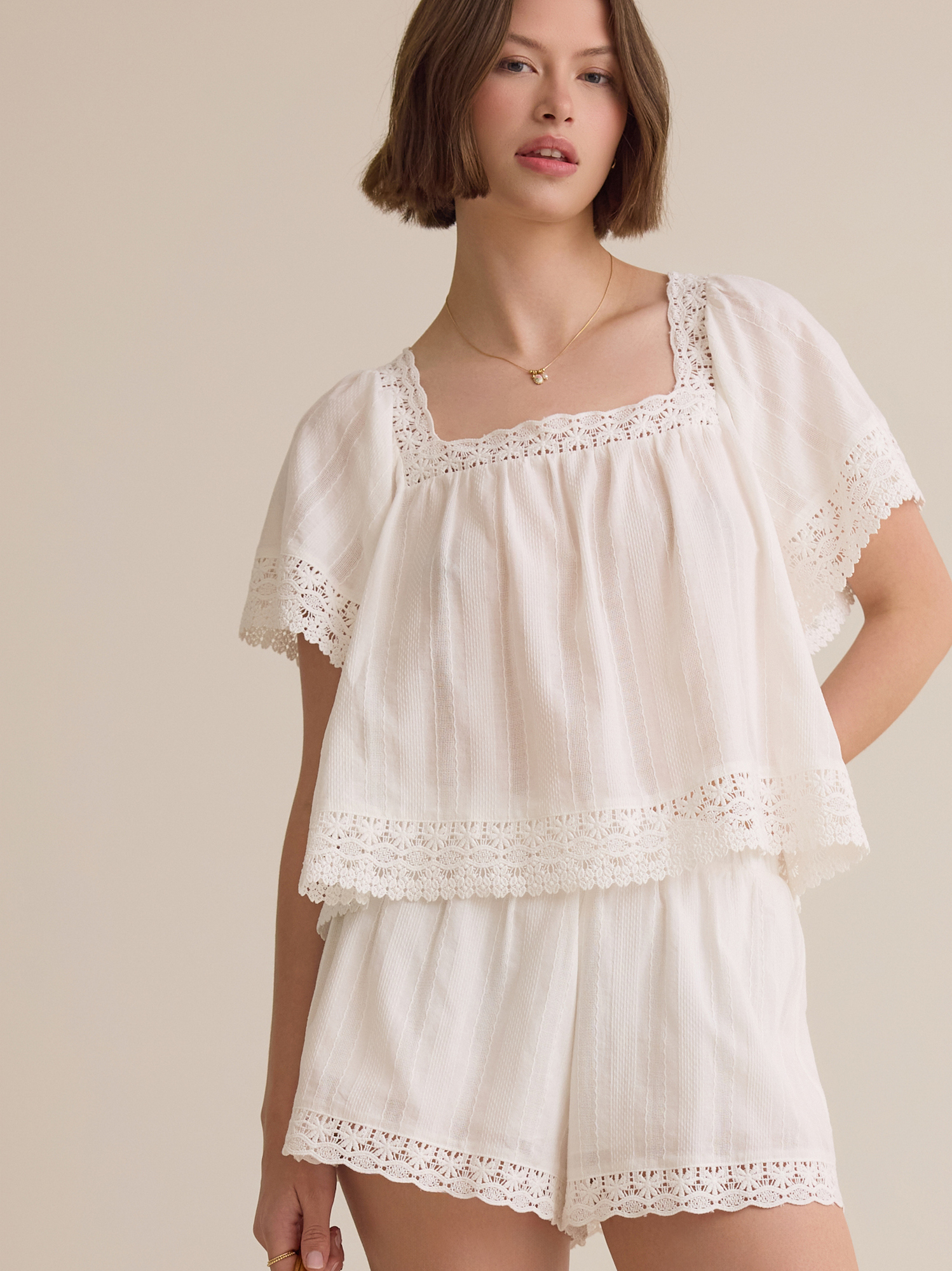 Isolde Lace Baby Doll Top in White | Altar'd State