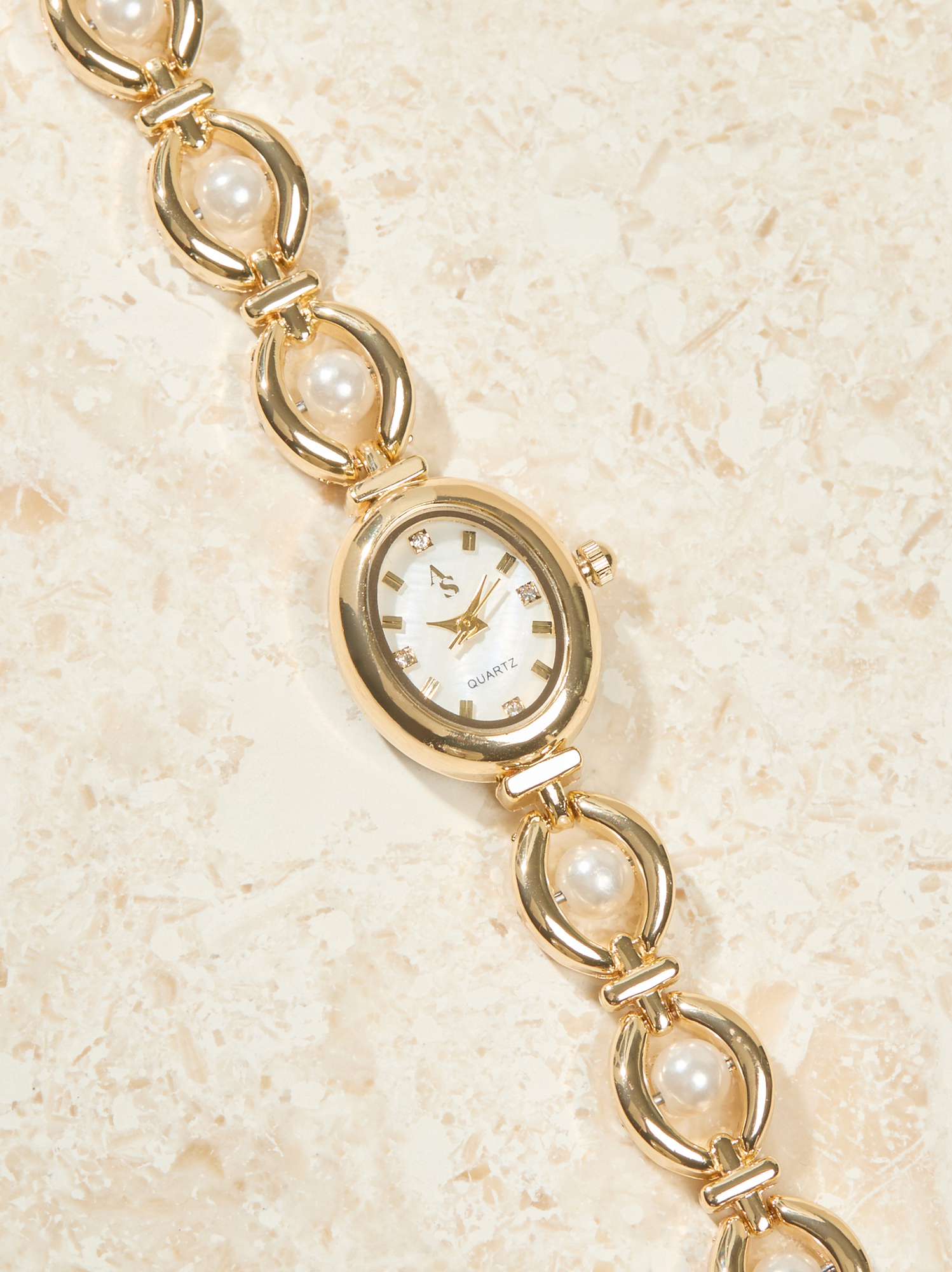 Pearl Oval Face Watch in Gold | Altar display picture 1