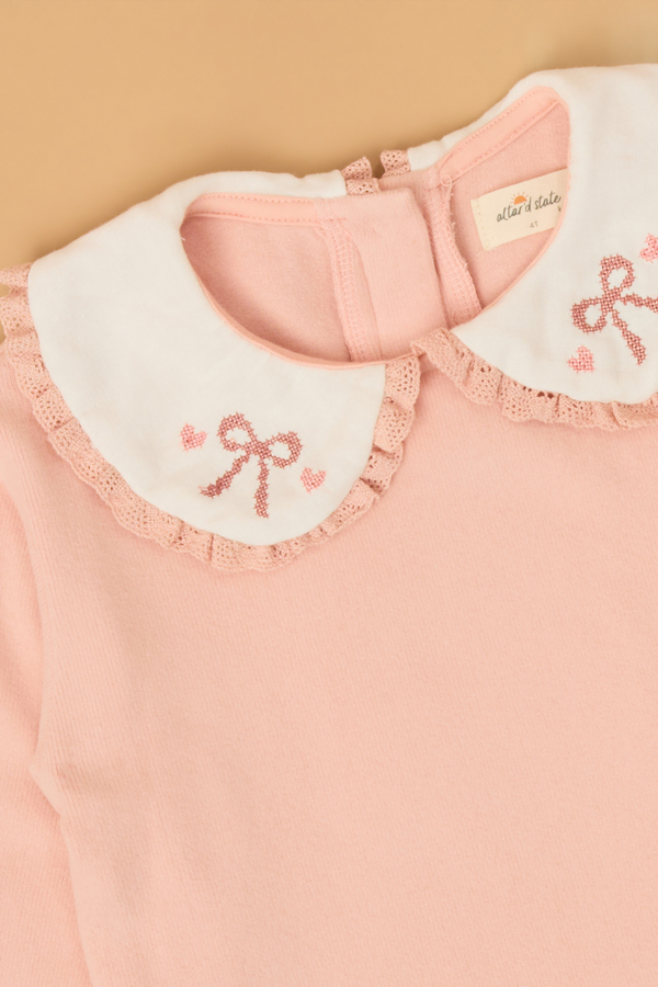 Colette Cross-Stitch Bow Sweater Detail 5 - Altar'd State
