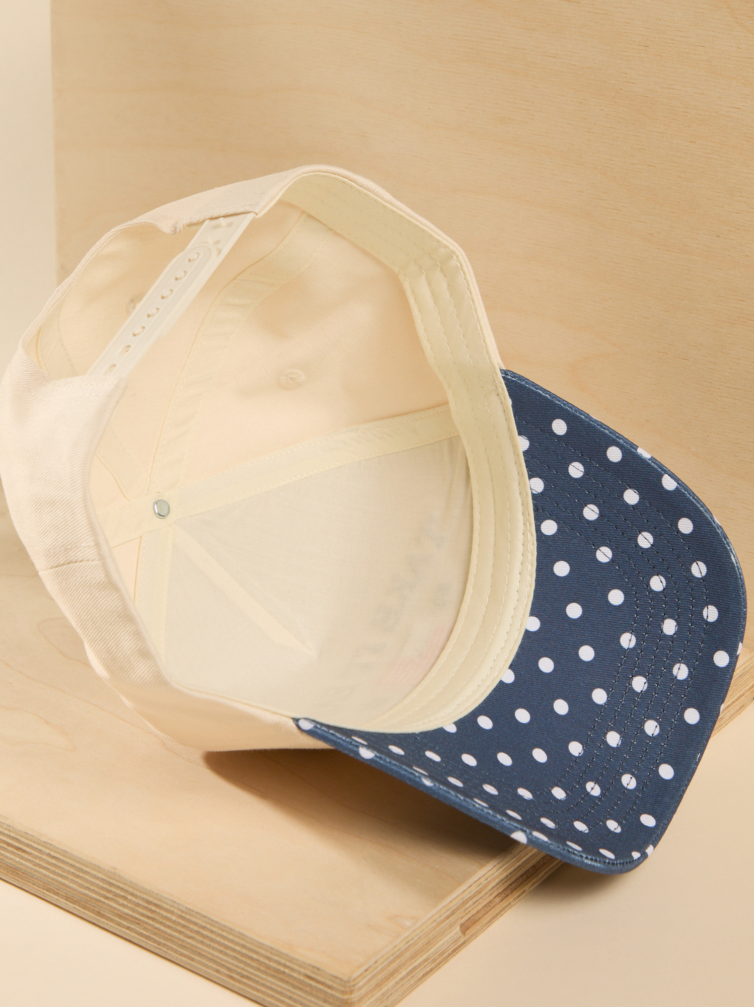 Take It Easy Polka Dot Trucker Hat in Navy Blue | AS Revival display picture 1