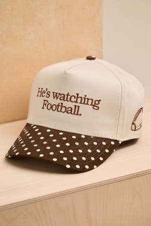 He's Watching Football Trucker Hat - Altar'd State